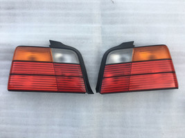 BMW E36 Sedan 4 door OEM Hella Tail lights set left + right - $54.82