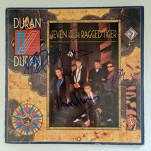 Duran Duran Autographed &#39;Seven and the Ragged Tiger&#39; LP COA #DD39722 - £713.77 GBP