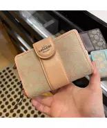 COACH Tabby Medium Wallet with Zipper in Women's Wallet (Gold Logo Orange) - $92.00