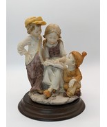 CAPODIMONTE VINTAGE PUCCI CARVING 3 CHILDREN READING FIGURINE ON WOOD ST... - $14.80