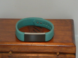 Pre-Owned Slim Teal Fitbit Smartband (For Parts) - $9.90