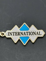 International Triple Diamond Logo Emblem keychain/backpack jewelry. (J1) (E11) - £11.98 GBP