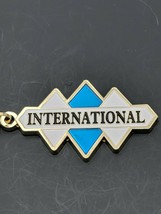 International Triple Diamond Logo Emblem keychain/backpack jewelry. (J1) (E11) - £11.98 GBP