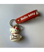 Hello Kitty Sanrio Wrist Band Keychain Gold &amp; Red With Hello Kitty In Co... - $11.74 CAD