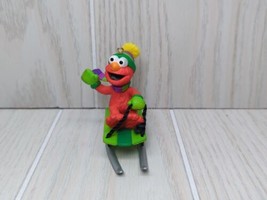 Sesame Street Elmo on green sled wearing hat scarf 2001 Christmas Tree O... - $9.89