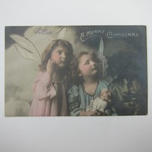 Christmas Postcard Girls Dressed Angel Wings Hold Doll Rotograph Co Antique 1911 - £7.94 GBP