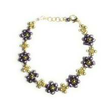 Purple and Gold Daisy Seed Bead Bracelet with Lobster Clasp - €5,10 EUR