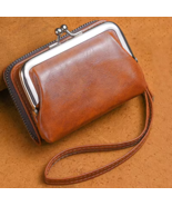 Retro-style women's wallet with a wrist strap, card slots, and a money c... - $14.99
