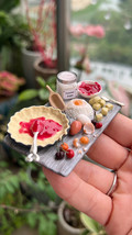 Miniature dollhouse cherry pie baking scene. - $159.00