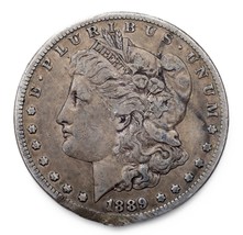 1889-CC $1 Silver Morgan Dollar in Fine Condition, VF in Wear, Rim Damage - £1,168.57 GBP