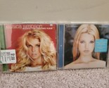 Lot of 2 Jessica Simpson CDs: Rejoyce the Christmas Album, Sweet Kisses - $8.54
