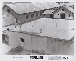 Papillon 1974 original 8x10 photo Steve McQueen stands in prison yard - £23.73 GBP