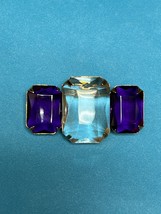 Avon Signed Large Clear Faceted Flanked by Two Emerald Cut Purple Plastic Rhines - £10.46 GBP