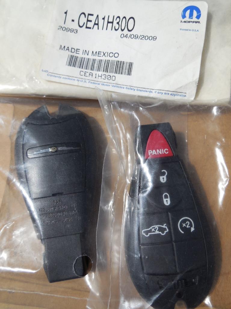 QTY 2 NEW FACTORY OEM Chrysler Key FOB CEA1H30O SHIPS TODAY! - $92.43