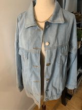 Jean jacket with print of the back size medium - $34.65