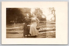 RPPC Pretty Edwardian Women &amp; Handbag Resting on Fence Real Photo Postcard I21 - £7.07 GBP