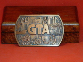 Pre-Owned GTA Automation Brass Color Belt Buckle - $17.82