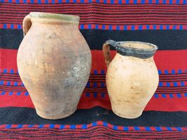 Two handmade pottery pitchers, antique rustic and primitive pitchers - $100.00
