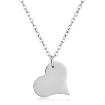 Silvertone Heart Pendant - $383.87 MXN