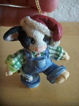 1994 Mary Moo Moo’s Cow in Overalls Christmas Ornament  - $190.36 MXN
