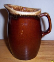 An item in the Pottery & Glass category: Home Treasure Pottery Cook Brown Drip Ovenproof Serving Creamer USA Hull Pitcher