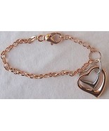  Silver and copper hearts bracelet  - $82.06 CAD