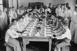 Naval Cadets sit at long table with bowls in front - $19.97