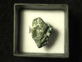 A unique dark-green jasper ring that contains various patches of bumps and pits  - £17.31 GBP