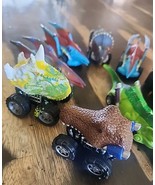Lot of 9 Assorted Plastic Dinosaur Monster Truck Car Toys - $17.44 CAD