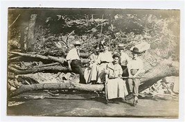 Men &amp; Women on Log Over Stream with Man Holding Rifle Real Photo Postcard - £30.07 GBP