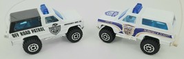 Vintage 1987 Matchbox White 1:64 Diecast Two Chevy Car Police SUV Bundle - $20.94