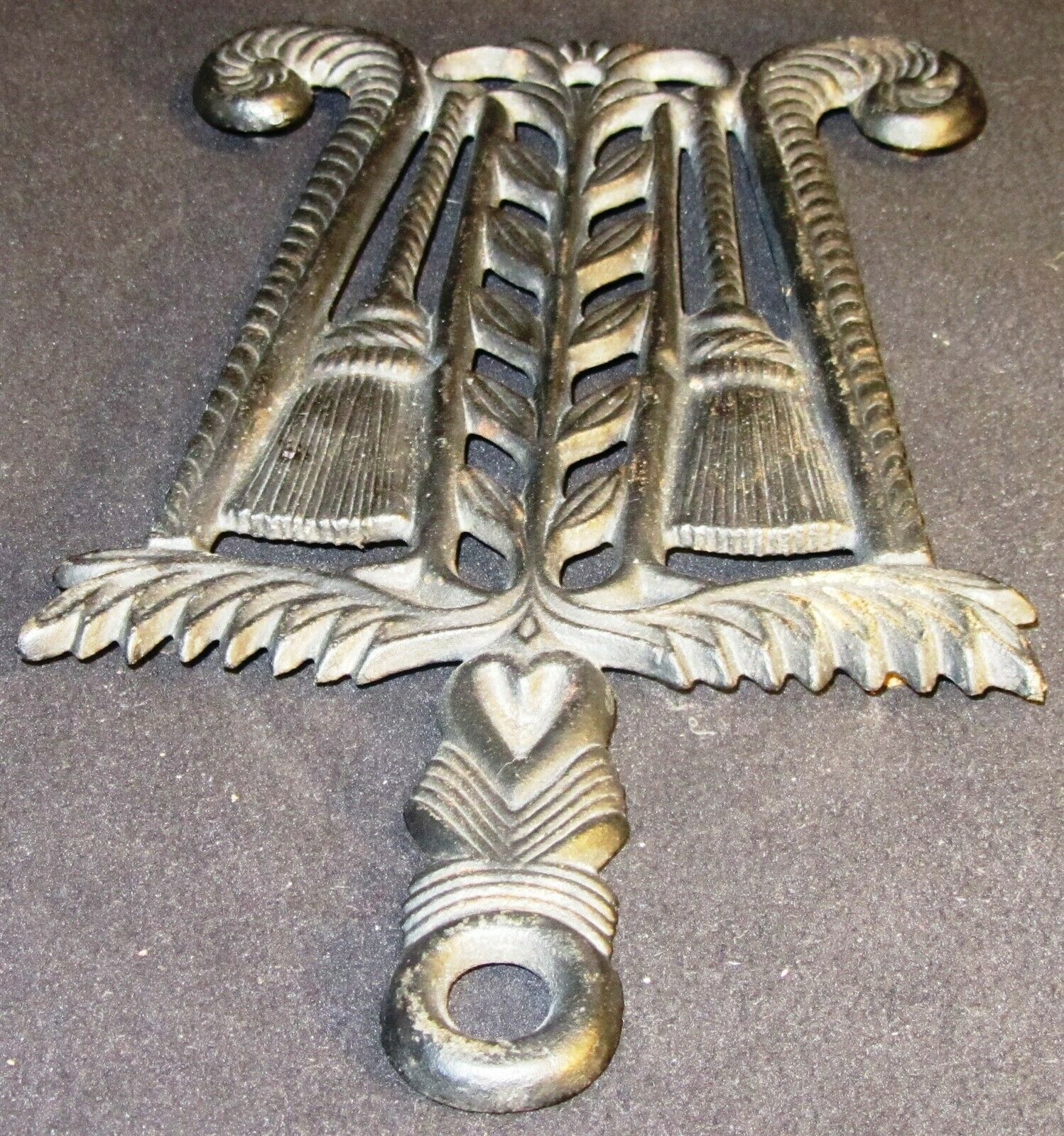 CAST IRON TASSELS WILTON TRIVET HOT PLATE - $6.00