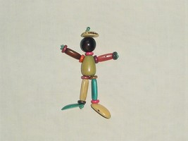 RARE VINTAGE FIGURAL BAKELITE JOINTED MULTI COLORED DOLL - $225.00
