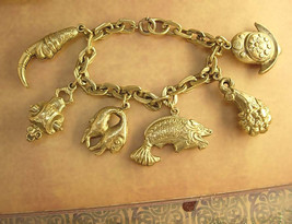 Victorian Charm bracelet Bizarre Unusual Charms Asian renaissance medieval - £131.86 GBP