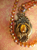 Fiery Deco deco  mermaid locket necklace sun and fire Glass beads Skeleton key - £175.73 GBP