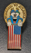 1996 Atlanta - Mascot Izzy Holding USA Flag - Olympic Lapel/Hat Pin Badge - £7.90 GBP