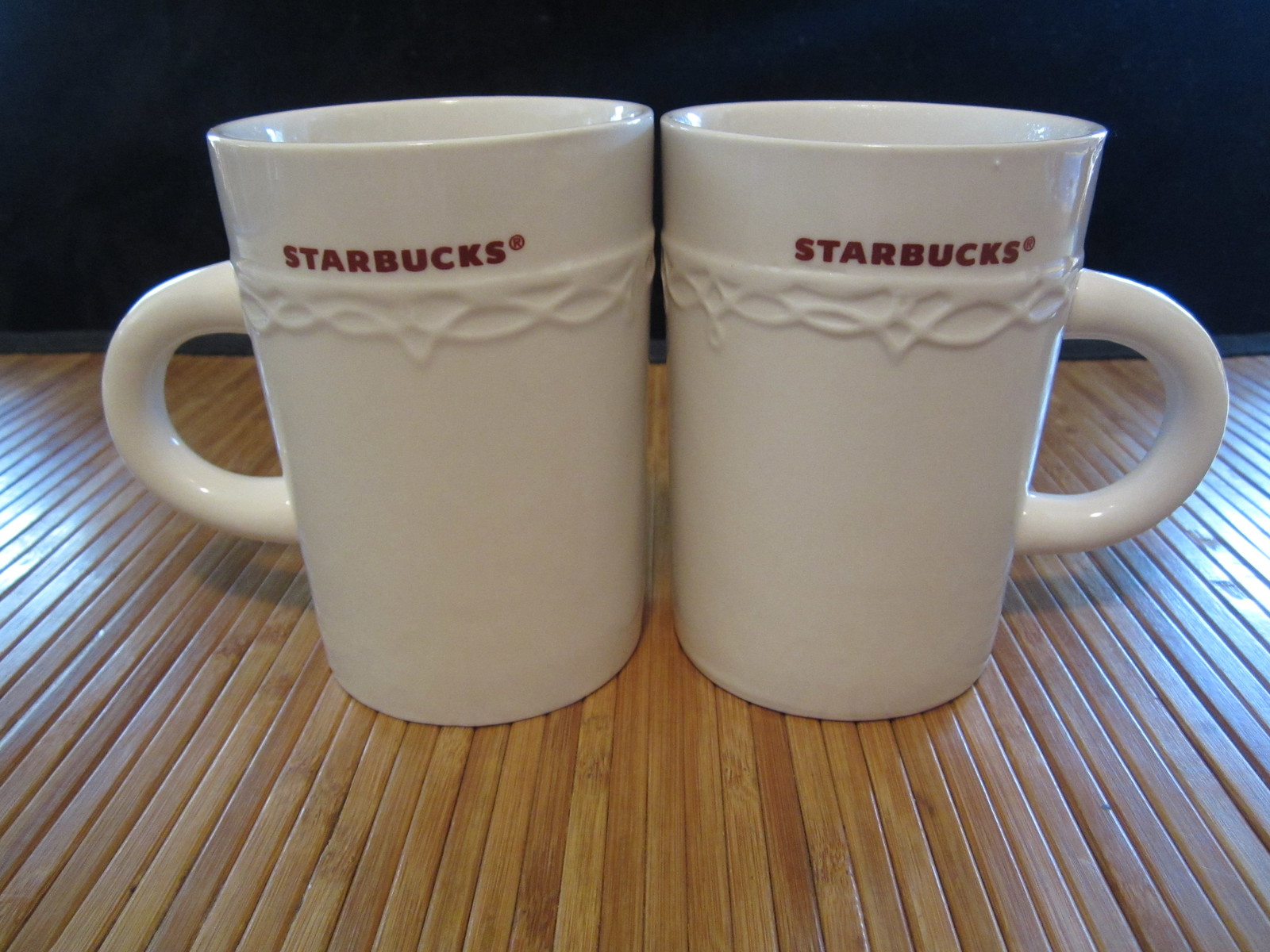 2 STARBUCKS Coffee Tea Cup 2010 White Mug with Red Lettering Embossed 10 oz - $19.99