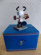 Peanuts on Parade “Snoopy Delivers” Figurine  - $40.00