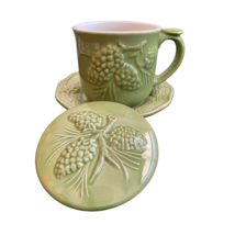 Evergreen and Pinecone Porcelain Tea Cup with lid and saucer - $19.76