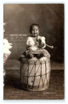 New Mexico NM Tesuque Pueblo Indian RPPC Ameliana Baby Sitting On Drum - £84.75 GBP