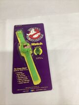 1986 VINTAGE  THE REAL GHOSTBUSTERS WATCH SLIMER THE GREEN GHOST MINT ON... - $34.64