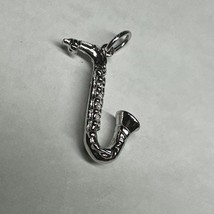 VINTAGE STERLING SILVER SAXSOPHONE CHARM - $380.79 MXN