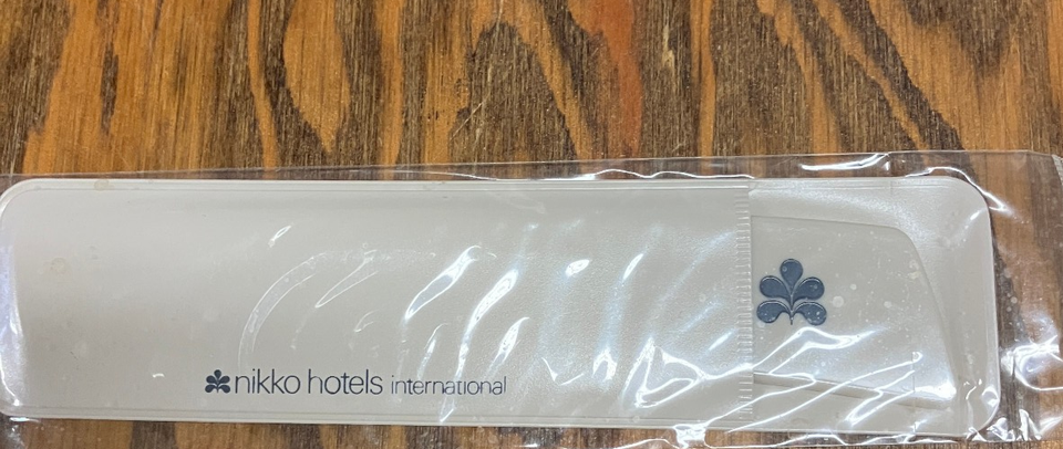 Nikko hotels international vintage plastic pocket comb still in original package Item image 3