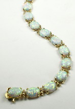 B003C, Created White Opal, 10K Gold Bracelet - $895.12