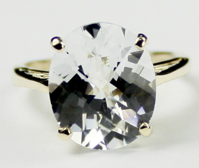 R055, 12x10mm Silver  Topaz, 10Ky Gold Ring