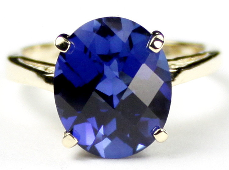 R055, 12x10mm Created Blue Sapphire, 10Ky Gold Ring