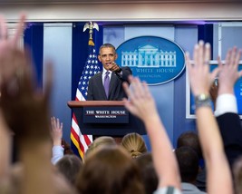 President Barack Obama takes questions in the White House Press Room Photo Print - £6.89 GBP+