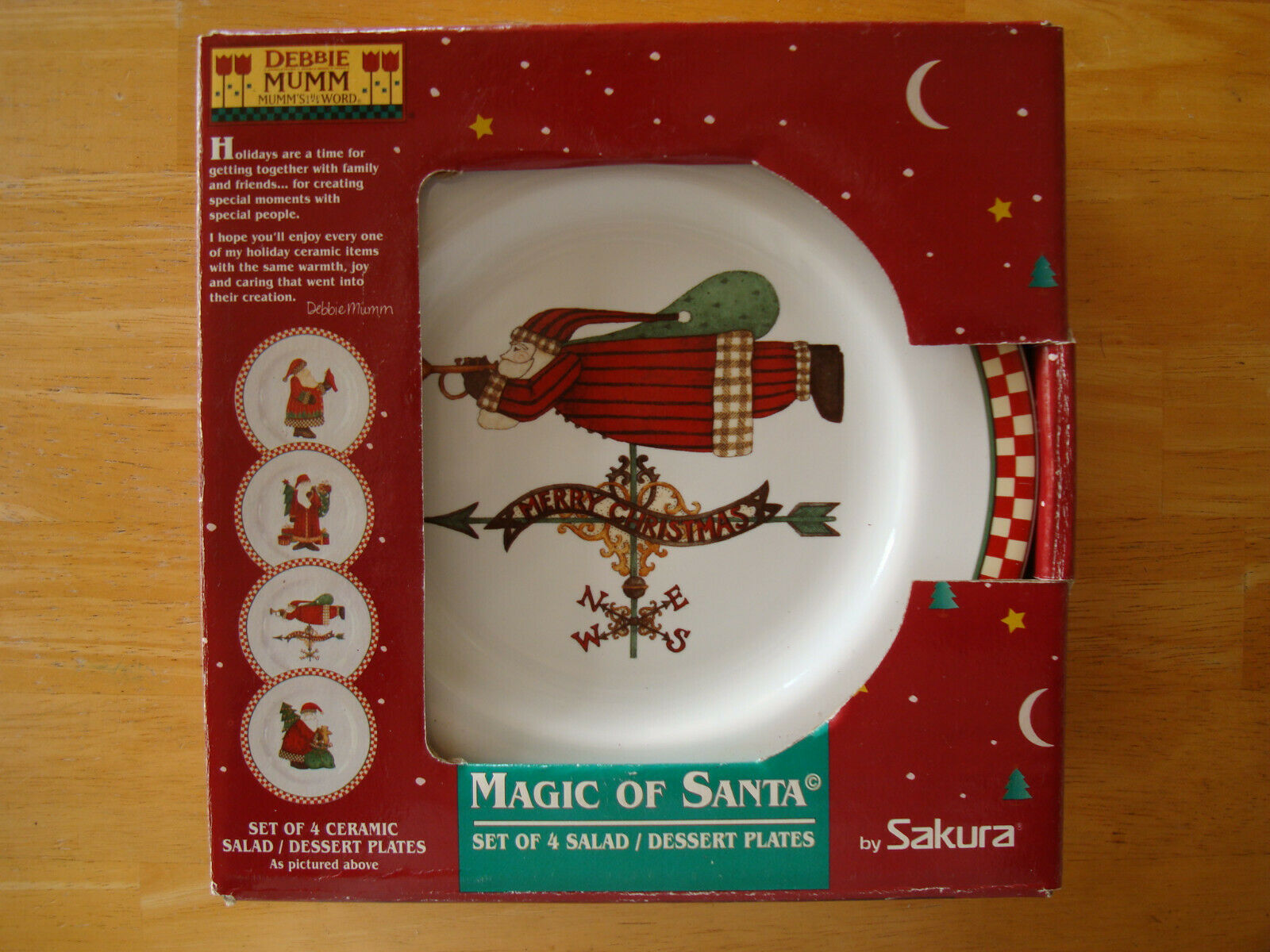 Primary image for Sakura Debbie Mumm Magic of Santa 4 salad dessert plates 1998 NRFB Christmas