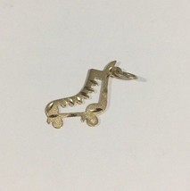 14k Yellow Gold Flat Roller Blade Charm With Diamond Cuts - $46.00