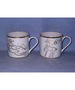 Rudolph Company 2 White and Gold Reindeer Mugs - $7.00